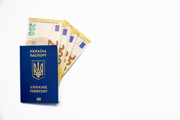 Passport of Ukraine, with euro banknotes on a white background. the concept of money, social assistance, travel, emigration, social payments.