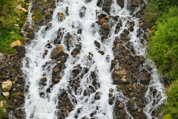 Central Asia. Tajikistan. Tributaries of the border river Panj are notable for numerous waterfalls and clean drinking water.