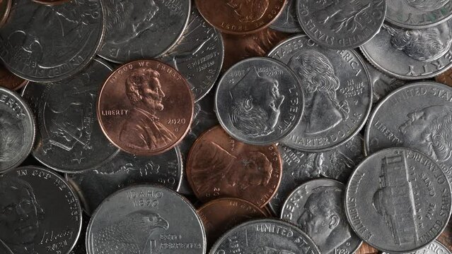 Slow moving United States coinage. Pennies, nickels, dimes and quarters.