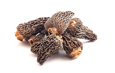 Wild Harvested Morel Mushrooms Trimmed and Dried on a White Background