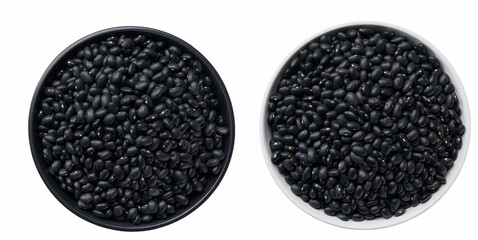 wooden bowl with black beans on a close-up texture of raw amaranthus.