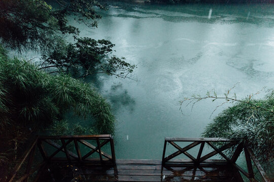 Teal river on a rainy day in the rainforest