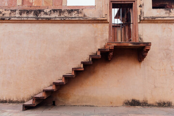 Details of a red, historic building in India
