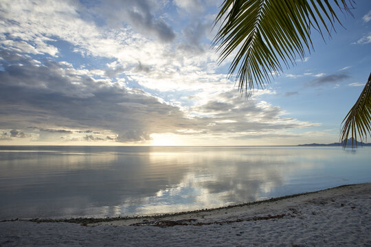 Landscape of tropical island and lagoon in Tahiti at sunset