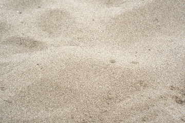 Fototapeta na wymiar Sfondo di sabbia fina in spiaggia