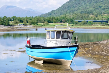 Old boat derelict on River Leven in Dumbarton