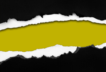 Ripped black paper on yellow background, space for copy