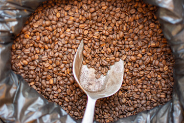 Coffee beans. Toasted coffee. Coffee bag. Brown

