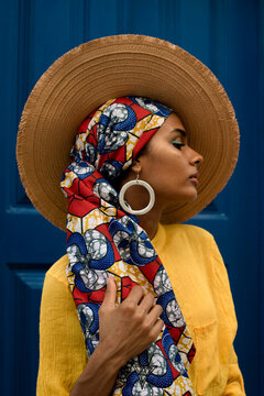 Stunning woman with round earring profile portrait