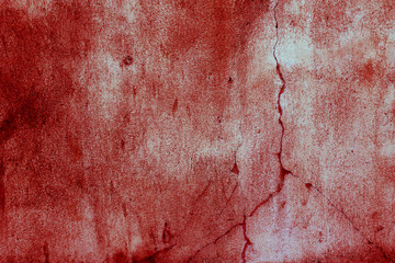 Cracked red background, scary bloody wall. white wall with blood splatter for halloween background.