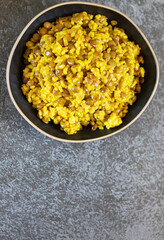 Traditional Middle Eastern dish Mujadara: lentils and rice on a dark background