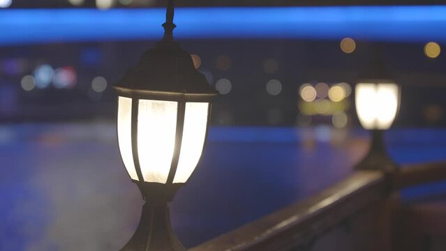 Lantern on the deck is shining during a night water walk CLOG clog c log Canon log1