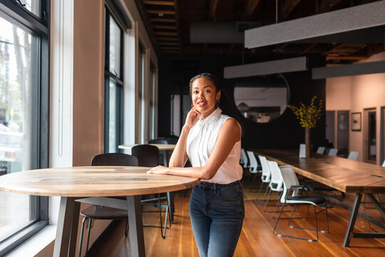 Businesswoman at empty cowork place portrait