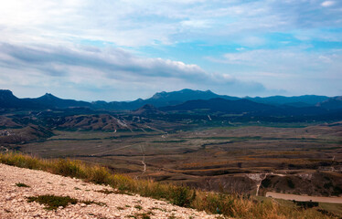 Fototapeta premium Beautiful mountain landscape with the sea on the horizon.