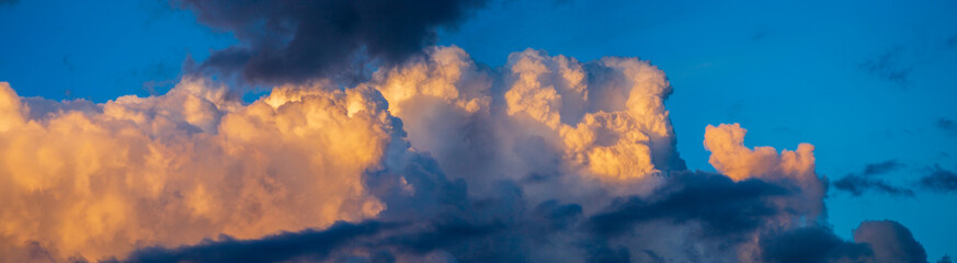 Sky panorama. Beautiful dramatic big clouds in the sky. Landscape of the power of heaven and nature. Copy space