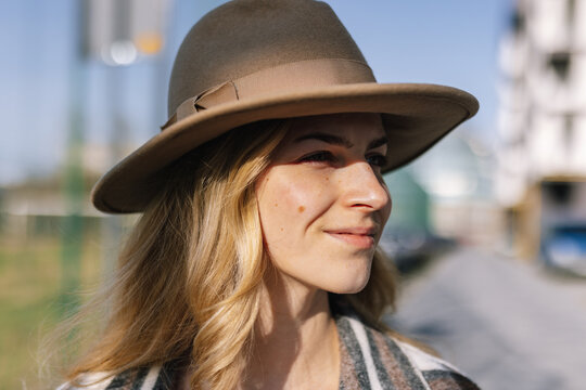 Portrait of pretty woman in voguish sun hat 