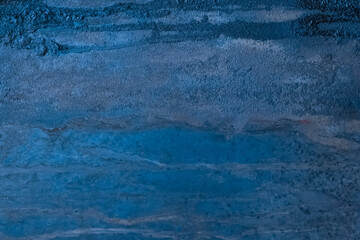 Blue metal surface with dark traces of fuel oil old steel texture industrial background