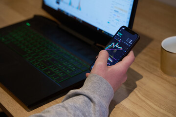 Smartphone with cryptocurrency chart