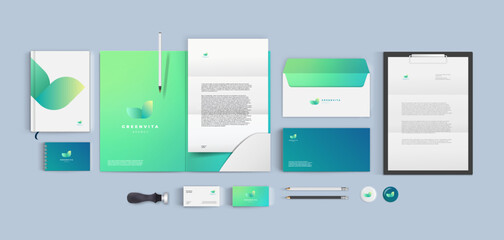 Green color corporate style with folder, business card and envelope. Modern branding identity with abstract minimalictic logo with leaf form can be used for eco company or food vegetable shop.