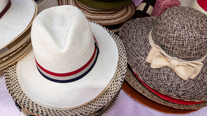 Handmade Panama Hats or Paja Toquilla hat or sombrero at the traditional outdoor market in Cuenca,...