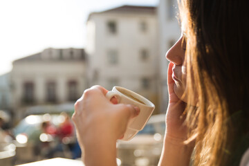 Woman in an outdoor cafe