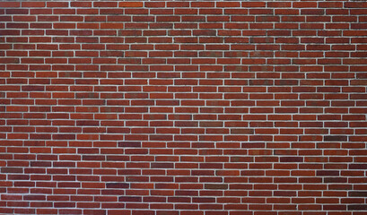 Fototapeta na wymiar Oldschool red brick wall in landscape orientation