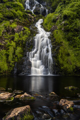 Fototapeta na wymiar view of the picturesque Assaranca Waterfall on the coast of County Donegal in Ireland