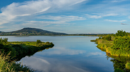 Fototapeta premium view of the Inch Levels Wildfowl Reserve on Lough Swilly at sunset