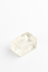 Icelandic Spar Crystal on White Background. Calcite. Viking Sunstone. Iceland treasures