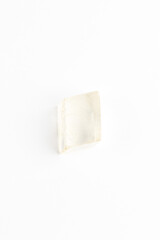 Icelandic Spar Crystal on White Background. Calcite. Viking Sunstone