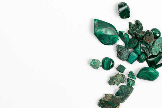 Green Semiprecious gems. Malachite mineral collection. Specimens on White Background. Green copper carbonate mineral
