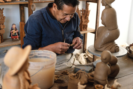 Artisan working with clay 