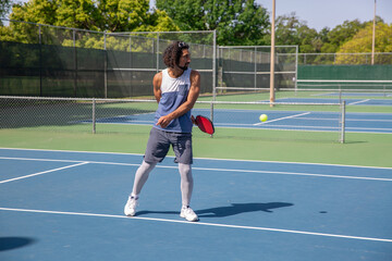 Middle Eastern Man Plays Pickleball 