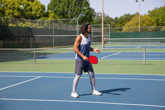 Middle Eastern Man Plays Pickleball 