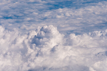 Clouds outside my airplane window from a comfortable cruising altitude 