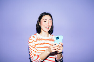 Asian Woman Using Mobile Phone