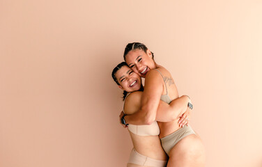 Joyful friends embracing