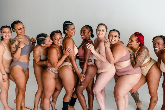 Laughing ladies pose for portrait