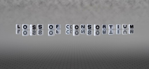 loss of consortium word or concept represented by black and white letter cubes on a grey horizon background stretching to infinity