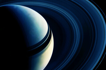Planet Saturn on a dark background. Elements of this image furnished by NASA © Artsiom P