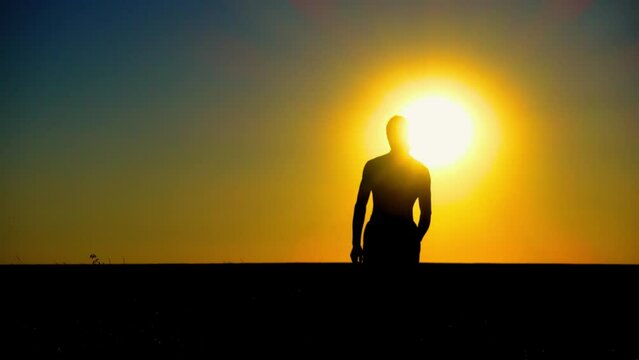 No war in Ukraine. Stop the war in Ukraine. A young guy throws out a Kalashnikov assault rifle. The guy throws away the weapon does not want to fight. The concept of pacifism and peace.