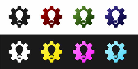 Set Light bulb and gear icon isolated on black and white background. Innovation concept. Business idea. Vector