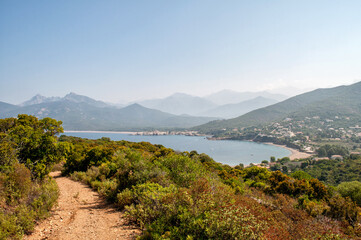 Fototapeta na wymiar View of the clear sea and rocky hills in Corsica, region Galeria