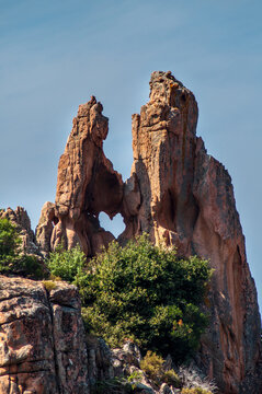 High rock with a heart-shaped hole - Calanche, Corsica
