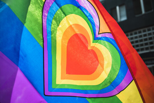 Fragment of a Rainbow love Pride flag with a heart