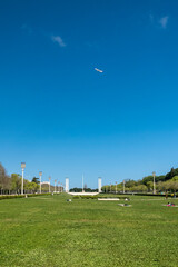 Fototapeta na wymiar Lisbon, Portugal. April 10, 2022: Eduardo VII Park on a summer day with a beautiful blue sky.