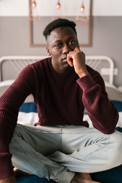 Sad African American man looking at camera