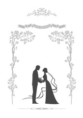 bride and groom in a floral frame.