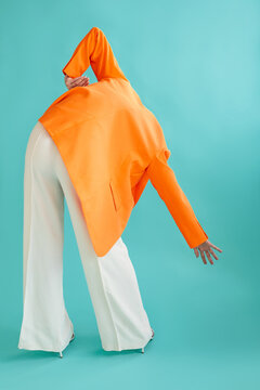 Anonymous woman in blazer - Vivid fashion in studio