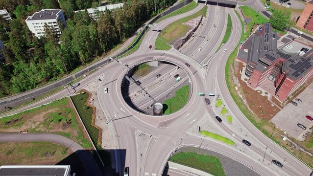 Aerial view of the Keha highway in Espoo city, Finland. Roundabout over the road.